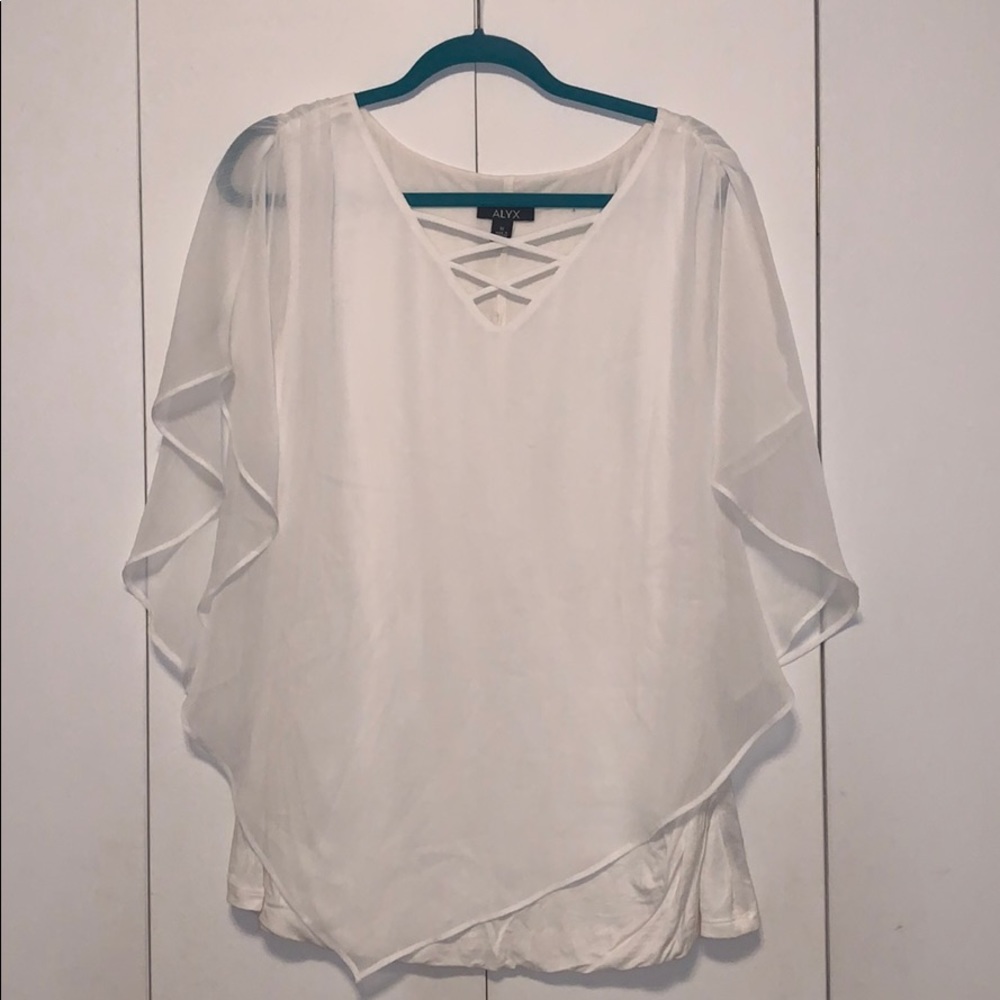 Gorgeous white blouse! Perfect for the holidays!